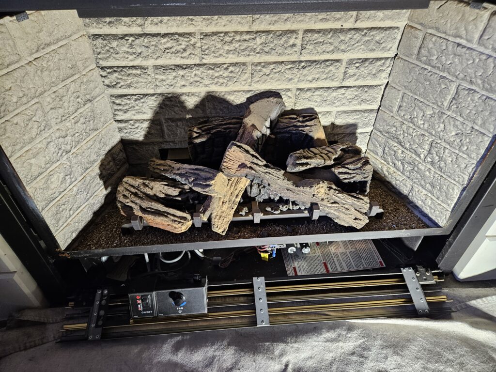 Technician Cleaning Fireplace  Loge in Richmond Hill